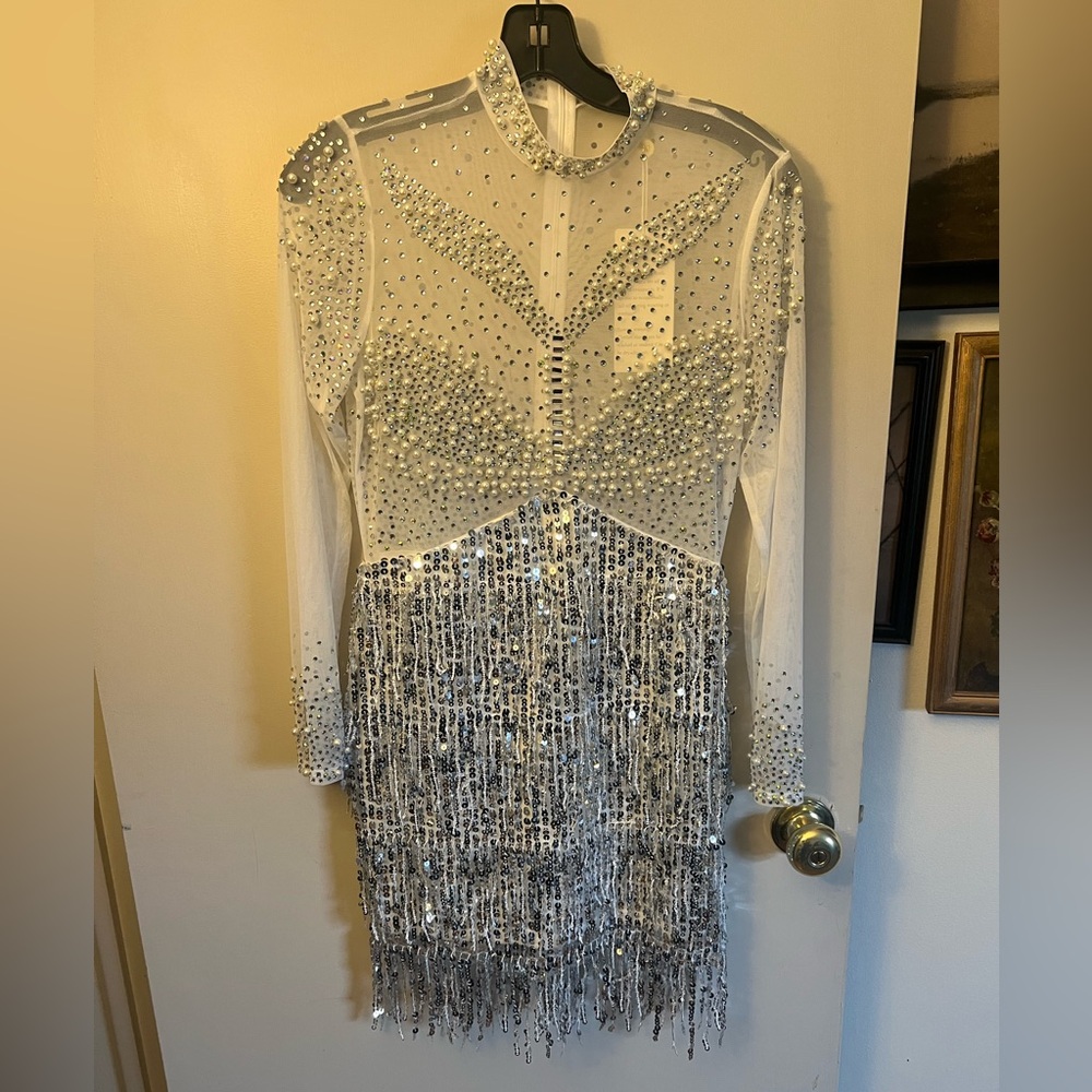White long-sleeved sequin and pearl rhinestone mesh mini dress.